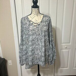 Black and White animal print long sleeve with lace up neck size large